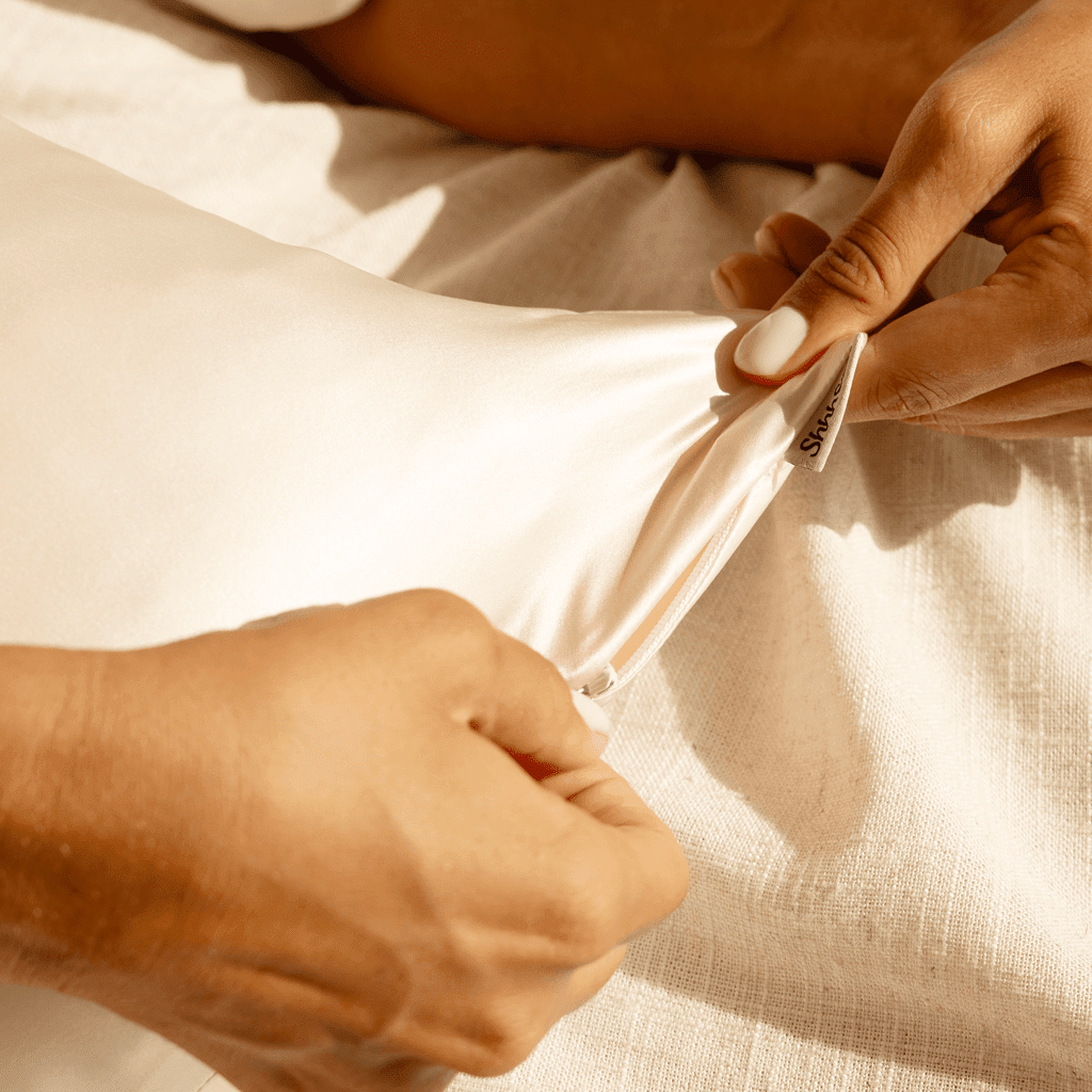Pink silk pillowcase with a neutral colour scheme